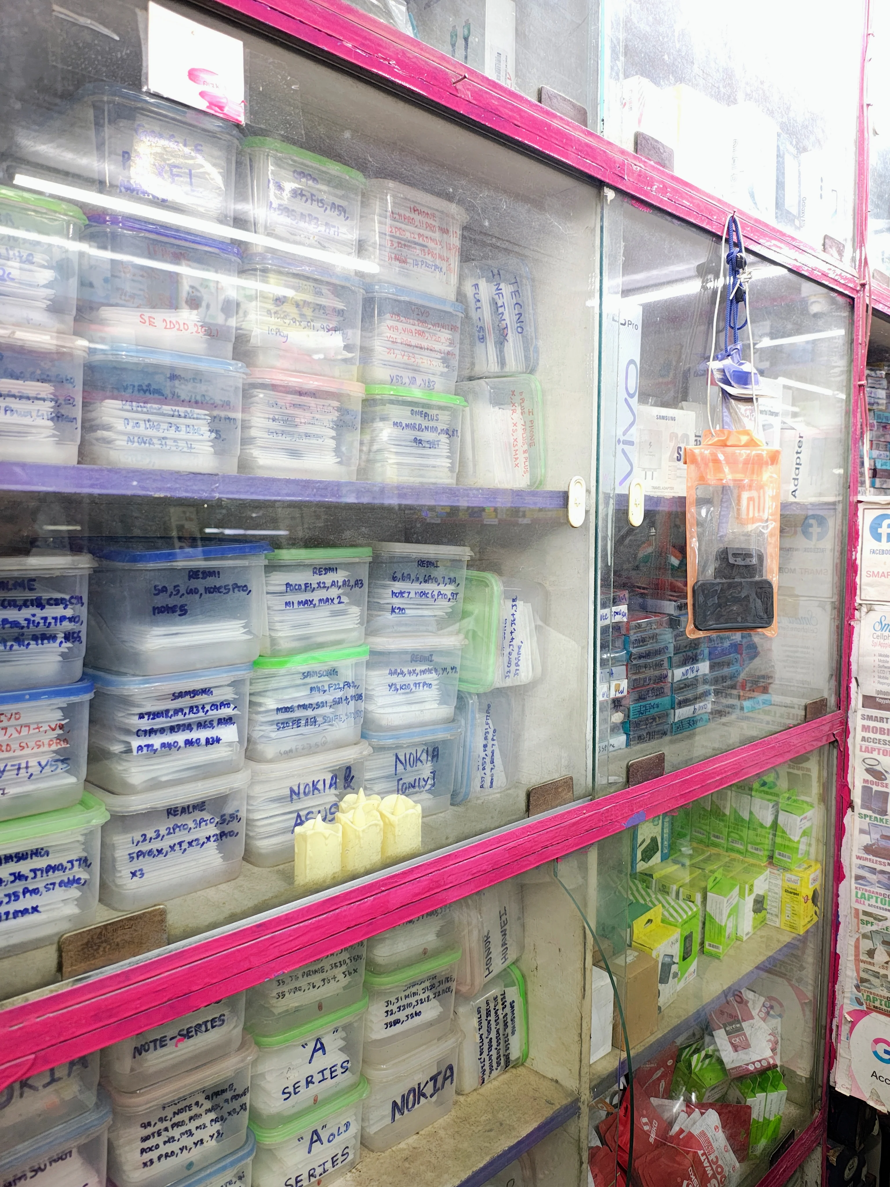 Smart Mobiles interior display racks showing phone covers and accessories